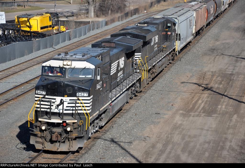 Grain train rolls east